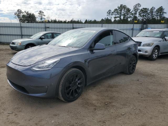 TESLA MODEL Y 2022 с VIN 7SAYGAEE6NF570055 - Фото с аукциона