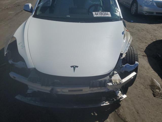 Photo 11 from auction – 2020 TESLA MODEL 3 with VIN 5YJ3E1EB4LF628647