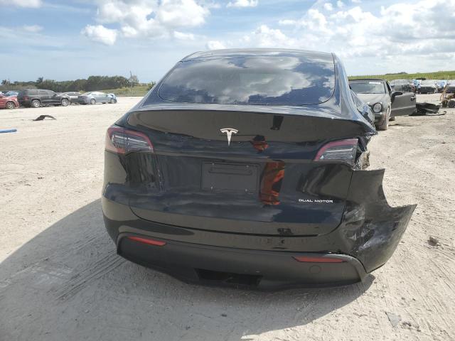 Photo 6 from auction – 2023 TESLA MODEL Y with VIN 7SAYGAEE7PF707734