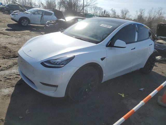 TESLA MODEL Y 2022 with VIN 7SAYGAEE9NF489339 - Photo from auction