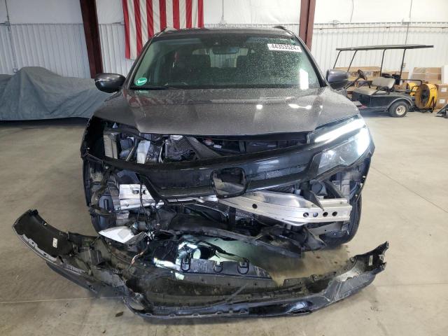 Photo 5 from auction – 2021 HONDA PILOT SE with VIN 5FNYF6H20MB017334