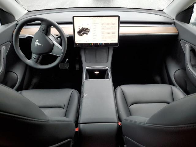 Photo 8 from auction – 2022 TESLA MODEL Y with VIN 7SAYGDEE7NF511856