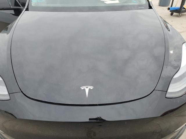 Photo 11 from auction – 2022 TESLA MODEL Y with VIN 7SAYGDEF7NF446175