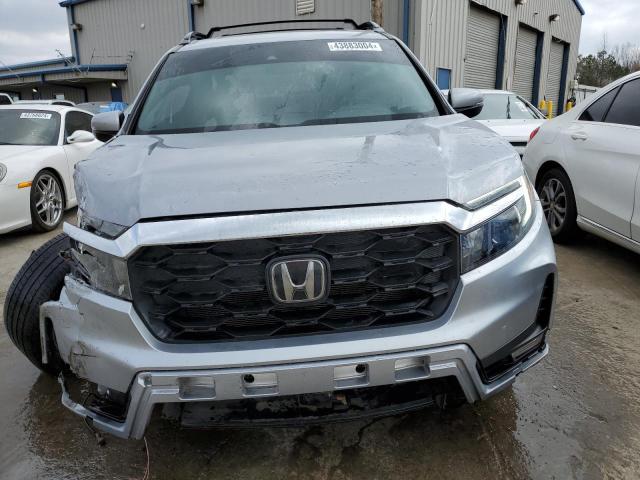 Photo 5 from auction – 2022 HONDA PASSPORT E with VIN 5FNYF7H5XNB002101