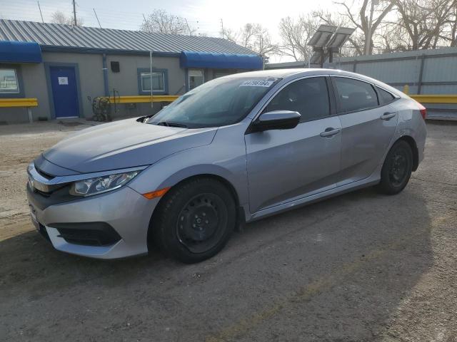 HONDA CIVIC LX 2018 with VIN 2HGFC2F52JH604079 - Photo from auction