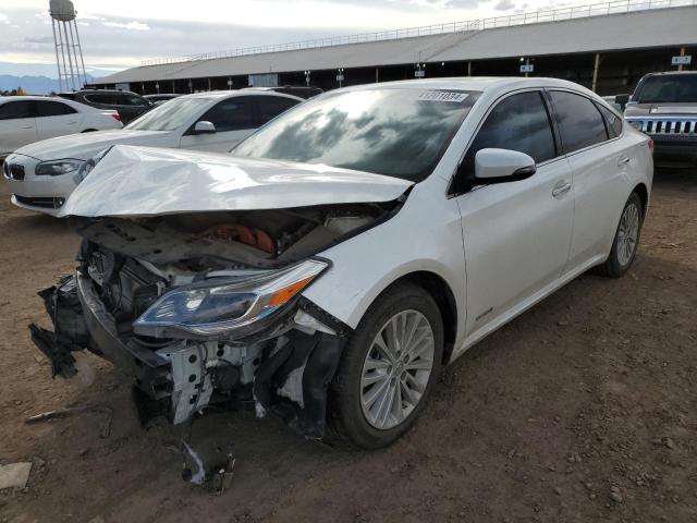 TOYOTA AVALON HYB 2014 with VIN 4T1BD1EB5EU029132 - Photo from auction