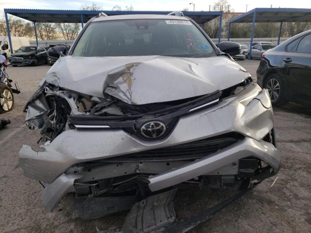 Photo 5 from auction – 2018 TOYOTA RAV4 LE with VIN JTMZFREV3JJ181377