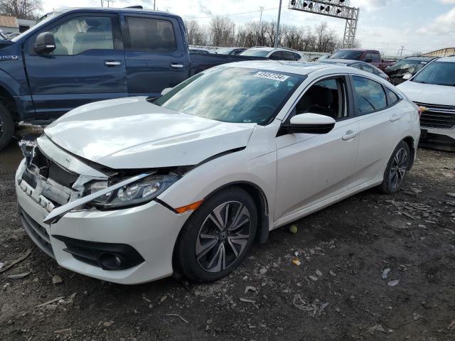 HONDA CIVIC EXL 2017 with VIN 19XFC1F74HE032058 - Photo from auction