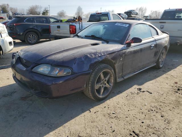 FORD MUSTANG 1997 with VIN 1FALP4045VF169136 - Photo from auction