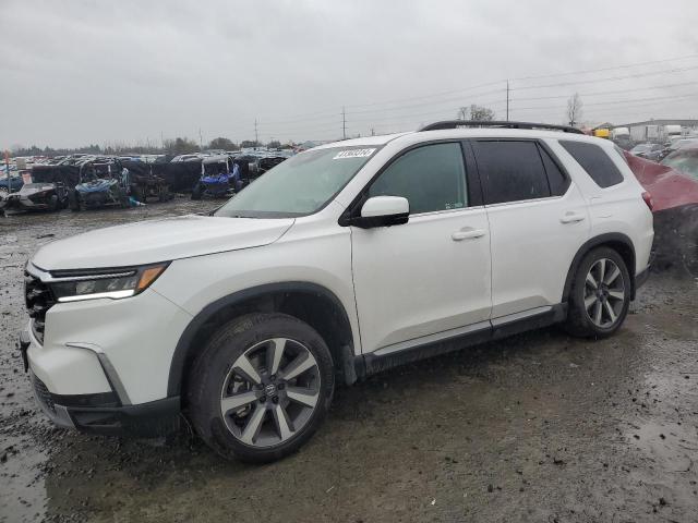 HONDA PILOT ELIT 2023 with VIN 5FNYG1H80PB004754 - Photo from auction
