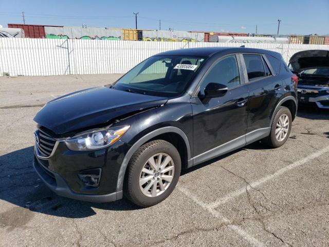 MAZDA CX-5 TOURI 2016 with VIN JM3KE2CY3G0854957 - Photo from auction