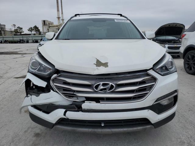 Photo 5 from auction – 2017 HYUNDAI SANTA FE S with VIN 5NMZU3LB2HH034740