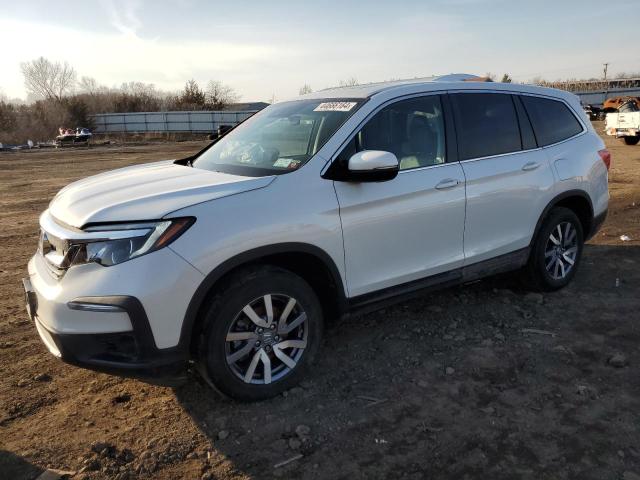 HONDA PILOT EXL 2022 with VIN 5FNYF6H56NB033565 - Photo from auction