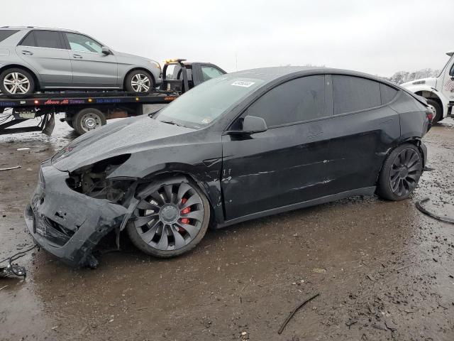 TESLA MODEL Y 2022 with VIN 7SAYGDEF7NF307891 - Photo from auction