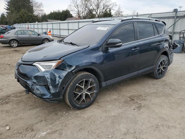 TOYOTA RAV4 SE 2018 with VIN JTMJFREV4JJ176993 - Photo from auction