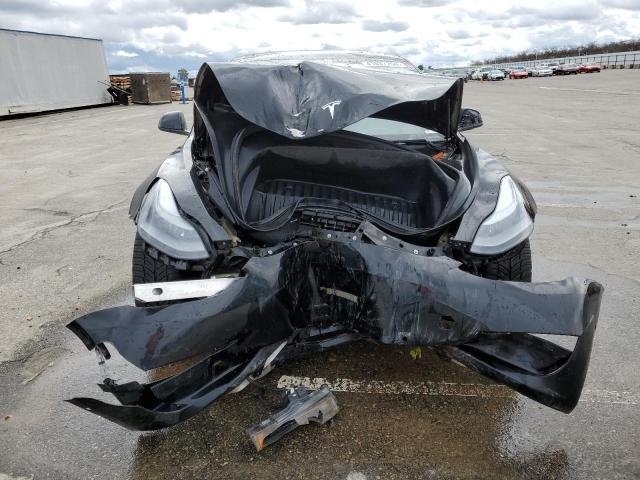 Photo 5 from auction – 2022 TESLA MODEL 3 with VIN 5YJ3E1EBXNF137843