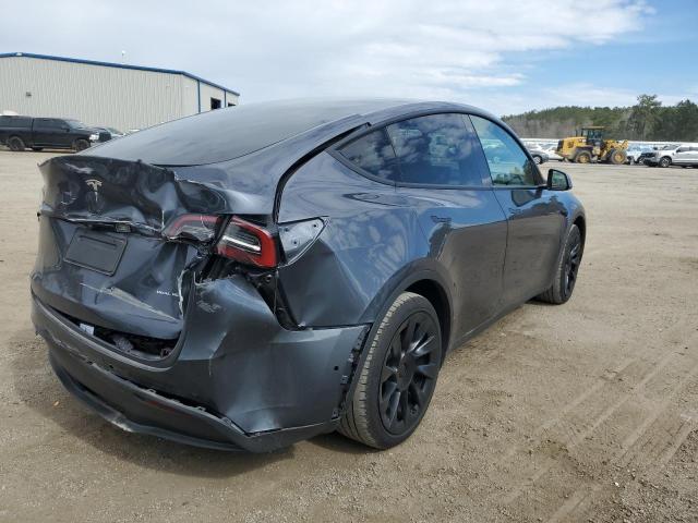 Photo 3 from auction – 2022 TESLA MODEL Y with VIN 7SAYGAEE6NF570055