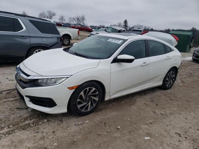HONDA CIVIC EX 2017 with VIN 19XFC2F74HE231231 - Photo from auction