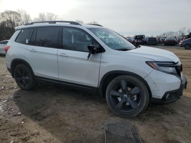 Photo 4 from auction – 2021 HONDA PASSPORT E with VIN 5FNYF8H01MB028515