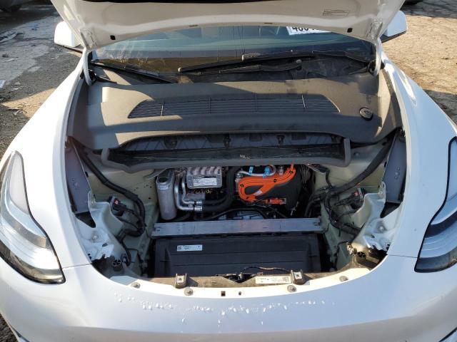 Photo 11 from auction – 2023 TESLA MODEL Y with VIN 7SAYGDEE9PA045363