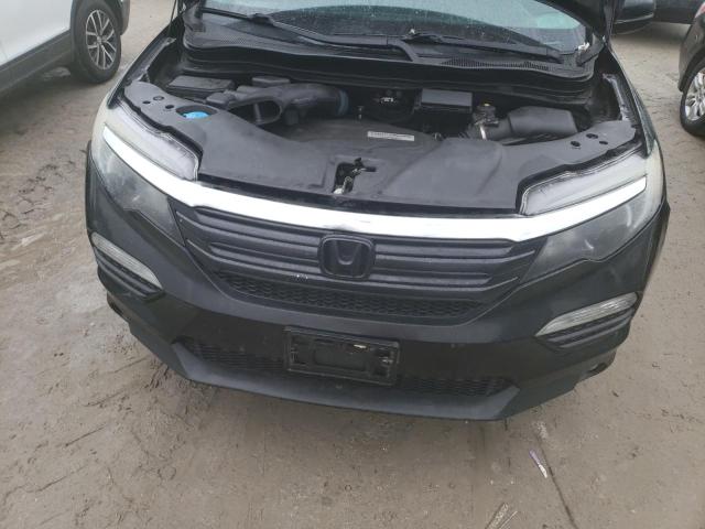 Photo 11 from auction – 2016 HONDA PILOT with VIN 5FNYF6H82GB069153