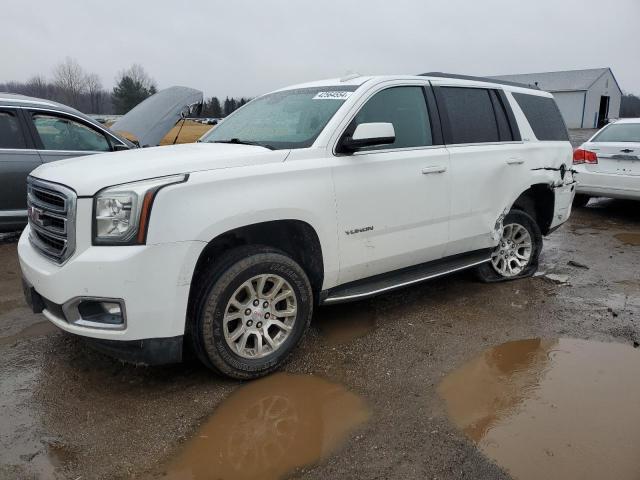 GMC YUKON SLE 2015 with VIN 1GKS2AKC5FR709824 - Photo from auction