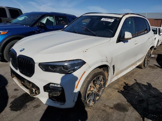 BMW X5 SDRIVE 2021 with VIN 5UXCR4C04M9F71015 - Photo from auction