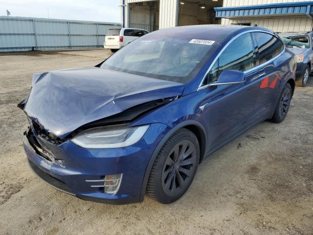 TESLA MODEL X 2018 with VIN 5YJXCAE26JF142684 - Photo from auction