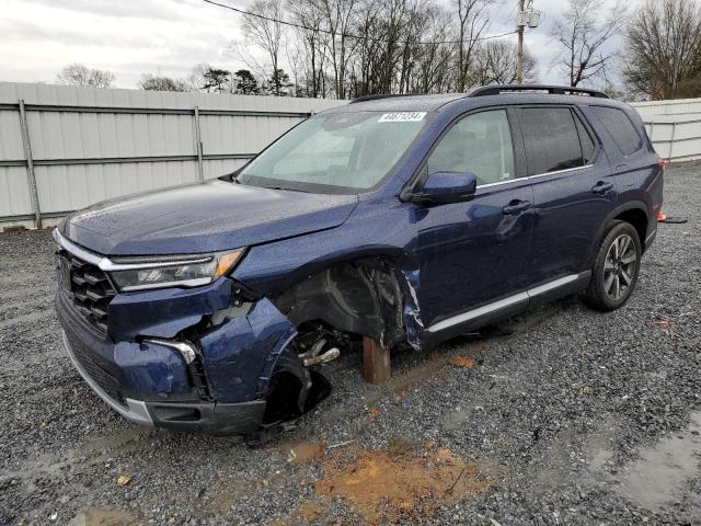 HONDA PILOT TOUR 2024 with VIN 5FNYG2H72RB002178 - Photo from auction
