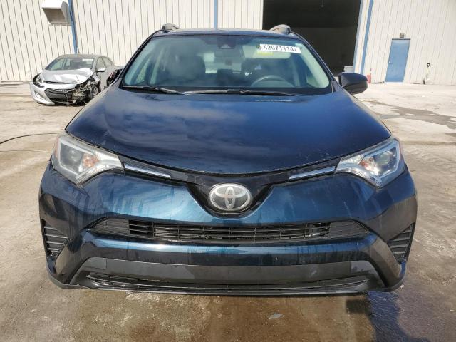 Photo 5 from auction – 2017 TOYOTA RAV4 LE with VIN JTMZFREV4HJ131386