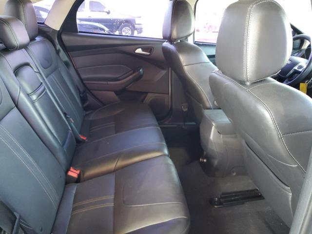 Photo 11 from auction – 2013 FORD FOCUS SE with VIN 1FADP3F25DL302000