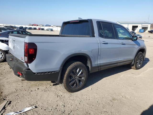 Photo 3 from auction – 2023 HONDA RIDGELINE with VIN 5FPYK3F16PB047843