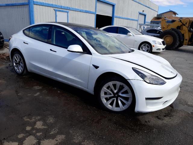Photo 4 from auction – 2022 TESLA MODEL 3 with VIN 5YJ3E1EB6NF143946