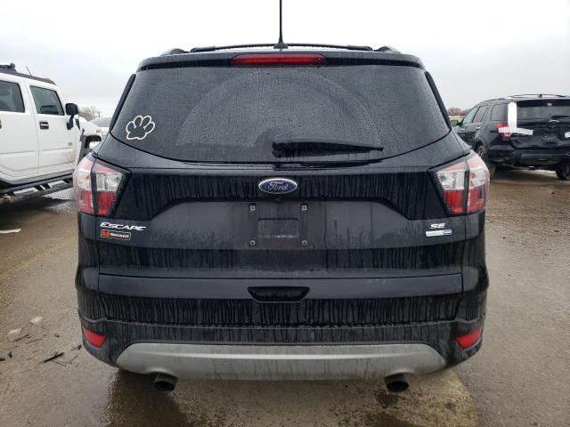 Photo 6 from auction – 2018 FORD ESCAPE SE with VIN 1FMCU9GD0JUA99956