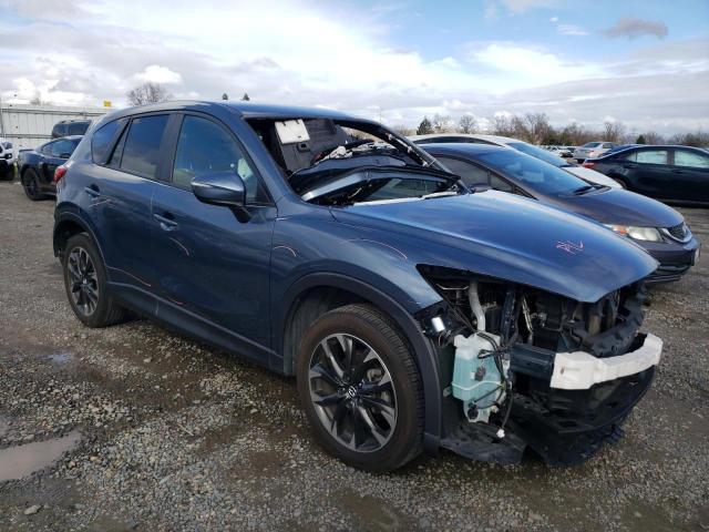 Photo 4 from auction – 2016 MAZDA CX-5 GT with VIN JM3KE4DYXG0763517