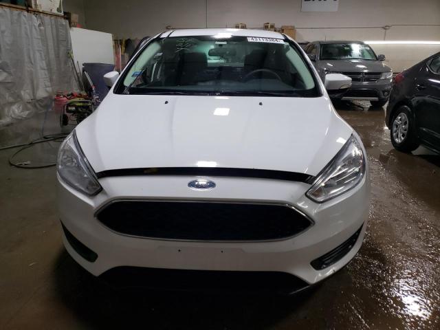 Foto 5 de la subasta – 2017 FORD FOCUS SE con VIN 1FADP3F26HL286976