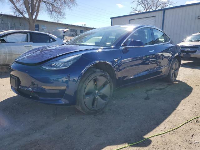 TESLA MODEL 3 2018 with VIN 5YJ3E1EB3JF090097 - Photo from auction