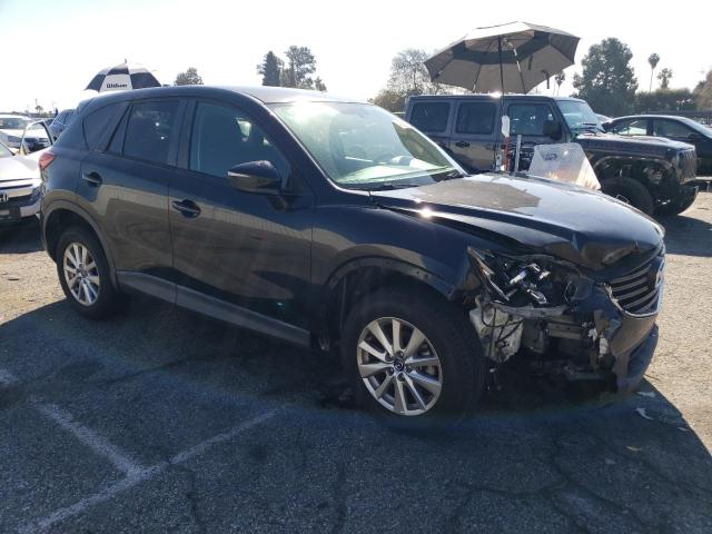 Photo 4 from auction – 2016 MAZDA CX-5 TOURI with VIN JM3KE2CY3G0854957