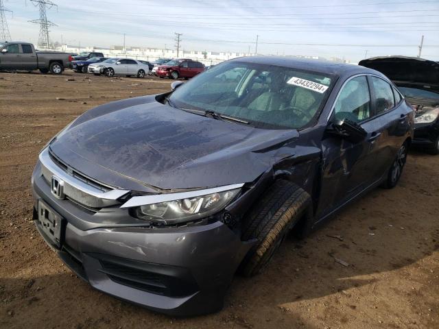 Photo 1 from auction – 2018 HONDA CIVIC EX with VIN 19XFC2F78JE038327