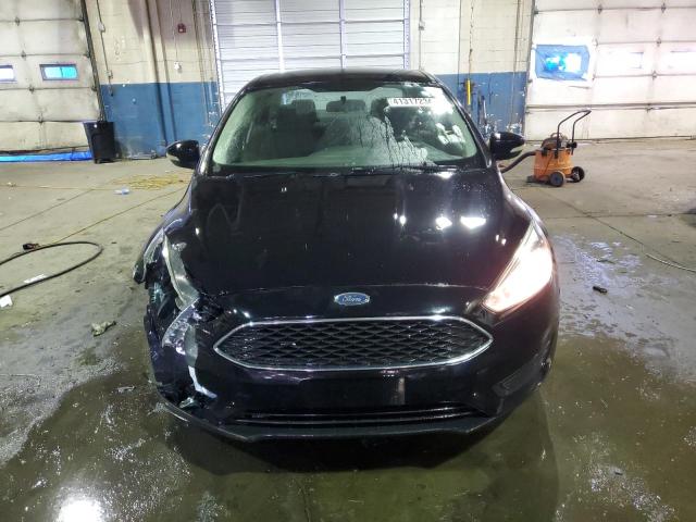 Photo 5 from auction – 2016 FORD FOCUS SE with VIN 1FADP3F24GL267356