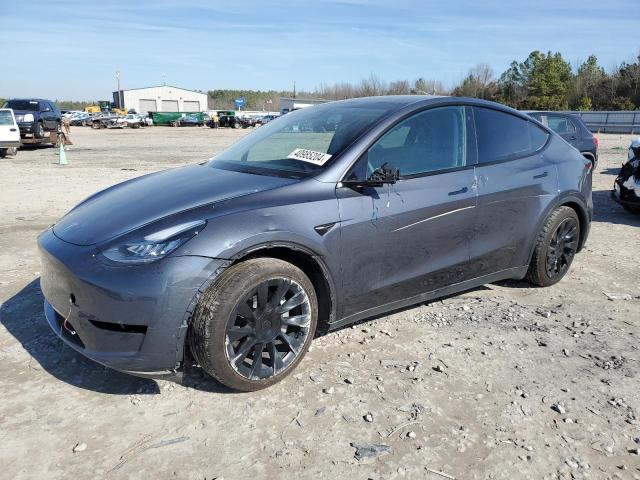 TESLA MODEL Y 2023 with VIN 7SAYGDEE8PA031468 - Photo from auction