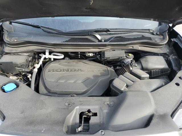 Photo 11 from auction – 2022 HONDA RIDGELINE with VIN 5FPYK3F72NB027784
