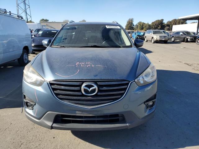 Photo 5 from auction – 2016 MAZDA CX-5 GT with VIN JM3KE2DYXG0789474