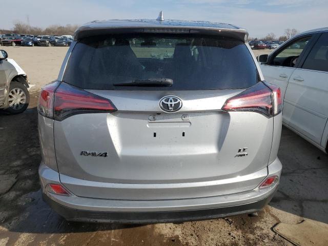 Photo 6 from auction – 2018 TOYOTA RAV4 LE with VIN 2T3BFREV8JW765129