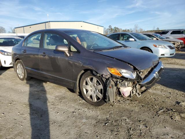 Photo 4 from auction – 2011 HONDA CIVIC LX with VIN 19XFA1F54BE048658