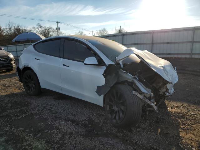 Photo 4 from auction – 2023 TESLA MODEL Y with VIN 7SAYGDEE4PF837424