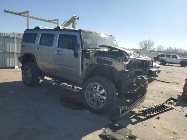 Фото 4 с аукциона – 2004 HUMMER H2 с VIN 5GRGN23U24H120950