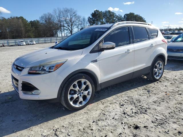 FORD ESCAPE TIT 2014 with VIN 1FMCU0J93EUB04735 - Photo from auction