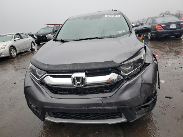 Photo 5 from auction – 2018 HONDA CR-V EX with VIN 7FARW2H50JE066198