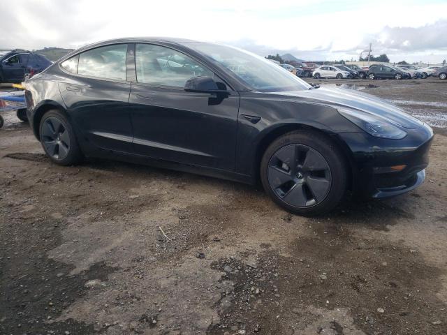Photo 4 from auction – 2023 TESLA MODEL 3 with VIN 5YJ3E1EAXPF647457